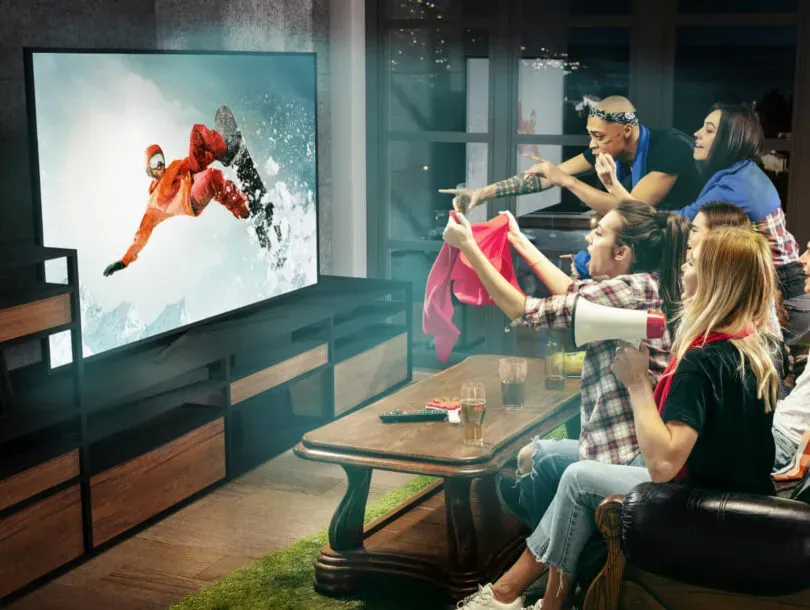 Live sports broadcast on a widescreen television